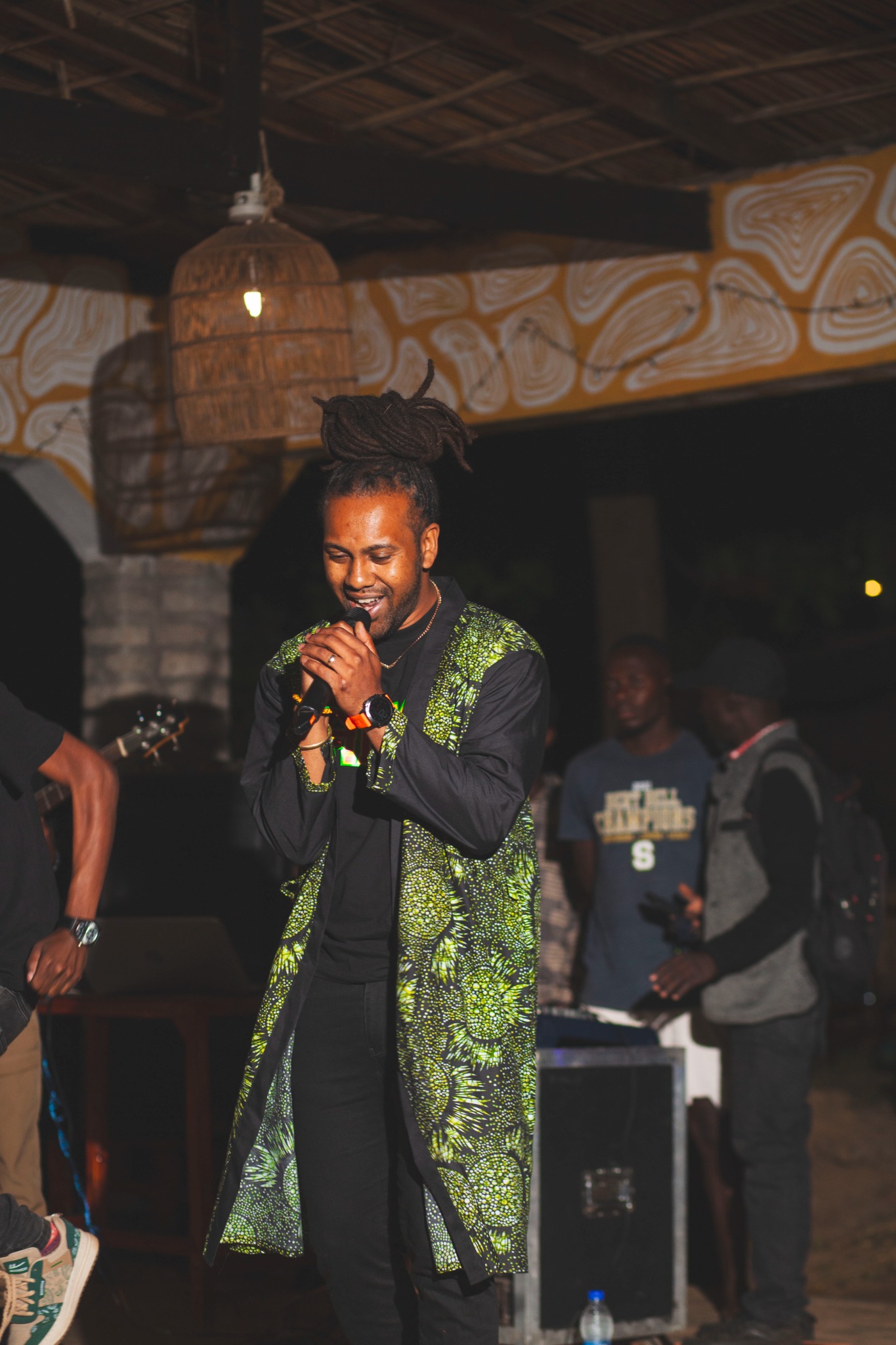 Ishan Cyapital performing live with a microphone